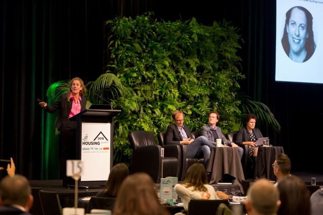 Romilly Madew (Green Building Council of Australia) speaking on the 'Improving the New Zealand Building Code' panel. With her are panelists Matt Petersen (Los Angeles Cleantech Incubator), Sam Archer (NZGBC) and Leonie Freeman (housing strategist). 