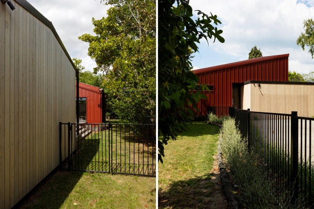 The gable roof forms repeat on the front and back blocks; the roof of the front block is also clad in Colorsteel.