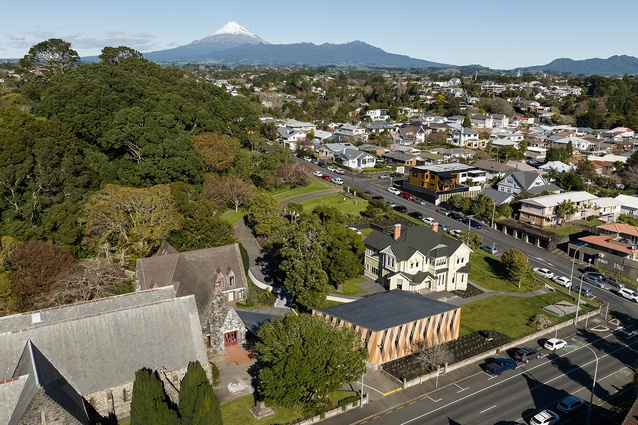 Aerial view with Mere Tapu (St Mary’s Cathedral) on the left — New Zealand's oldest stone church currently under strengthening — the Hatherley Hall rear left, the contemporary and Māori Te Whare Hononga, sitting slightly forward with strong road presence, but lower than the relocated, repurposed Sir Paul Reeves Centre.