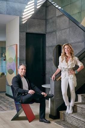 Home-owners Sebastian Maniscalco and
Lana Gomez –Sebastian is sitting on a vintage Vilbert chair, designed by Verner Panton.