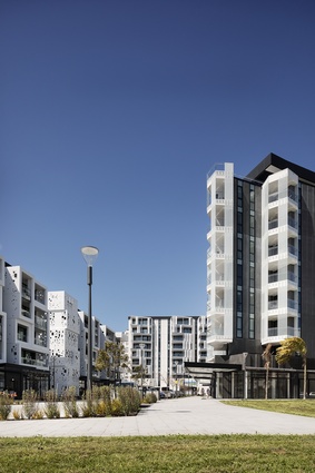 The new High Street, with ground-floor retail, separates the three apartment blocks.