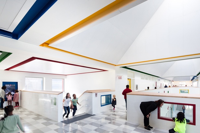 Kathleen Grimm School. Skylights and reflective ceiling panels reduce the need for artificial lighting, and solar hot water units further reduce energy use.