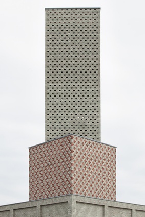 Abstract Tower, the Netherlands. A two-tone effect has been created, with most of the red clay bricks coated with a cement wash that gives them a pale mint-green colour.