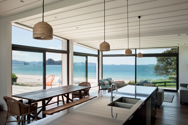 Dual-sliding doors not only keep the view to the fore, but allow for a measure of wind mitigation.