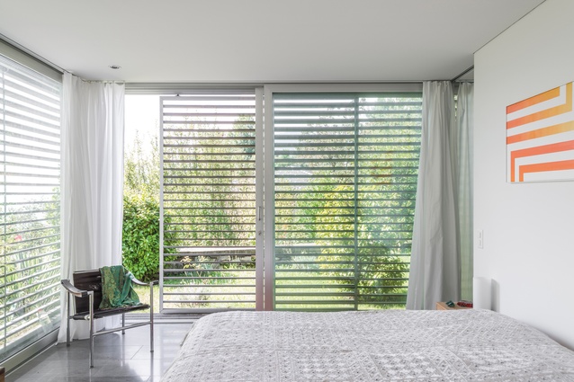 In addition to the lush surrounds, this bedroom soaks in ample natural light. 