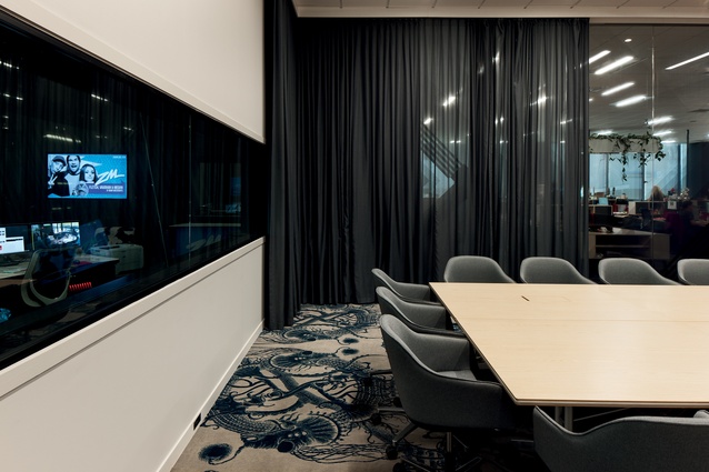 From the boardroom, meeting-goers have a view of the radio studios. 