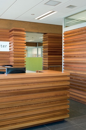 Anchor tenant, Young Hunter Lawyers has continued the exposed timber theme by using the material extensively in its own fit out.