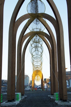 The artwork is suspended between the ten wooden arcades of The Arcade Project in Christchurch CBD. 