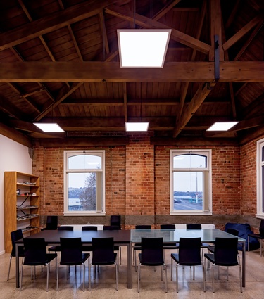 The original timber ceilings of 77 Vogel Street are offset against polished concrete floors in the offices of AD Instruments.