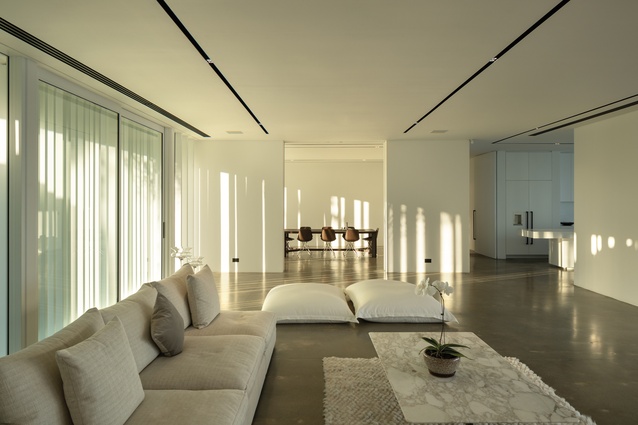 The concrete floors have a cooling effect in the living room and formal dining room.