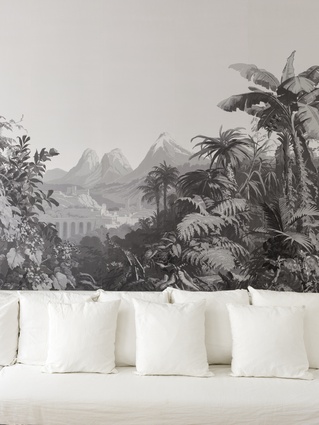 One of the walls is covered in a panoramic grisaille paper from Zuber.