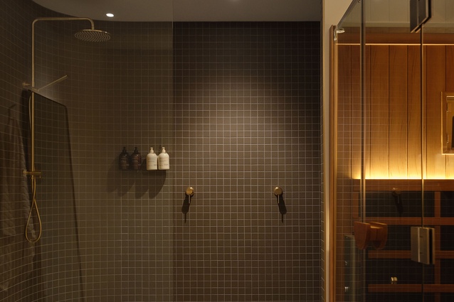 The saunas connect to the showers, a convenience for guests, preventing unnecessary travel through public areas. 