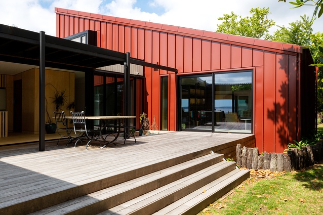 Sheltered outdoor living is accessed from all three sides.