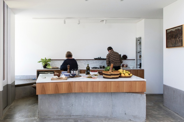 Concrete, marble and blackbutt come together to create a kitchen that enhances human comfort and demonstrates the “elegance of the essential.”