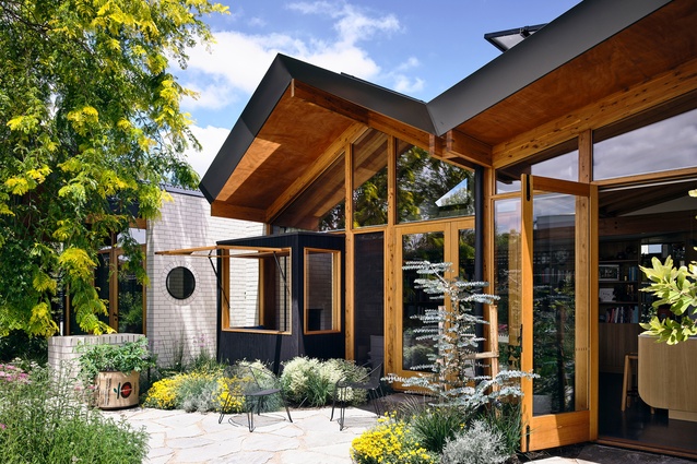 Generous double-doors provide views to the patio and make it easy for guests and fresh air to circulate.