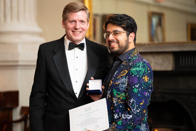 Sahil Tiku (on right) receives his award from Global Undergraduate Awards Chairman Jim Barry.