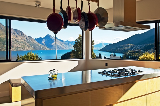 The kitchen windows showcase the view while cleverly obscuring the surrounding houses.