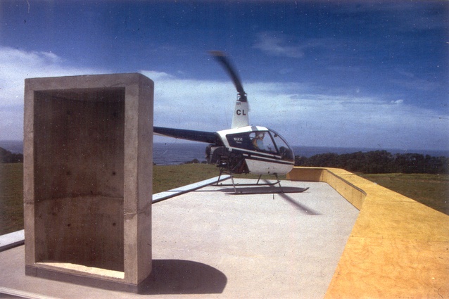 A Robinson R22 is testing the roof and suspended table for water spillage, 1997.