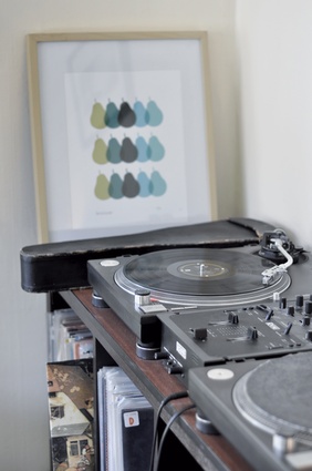 A vintage record player provides the background tunes for cooking nights.