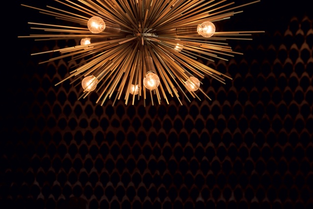 A starburst pendant in the private dining room.