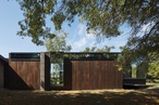 Tranquil and textural: a pavilion between trees 