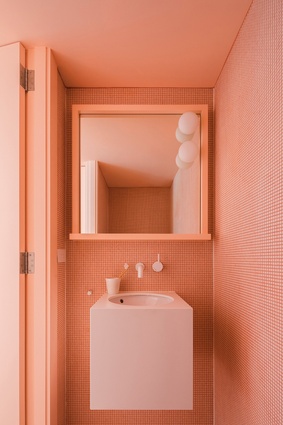 The coloured bathrooms are an element the clients “love living with, but would never have thought of.”