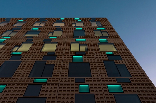 Some spandrel windows contain light boxes with colour-change LEDs to light the façade at night.