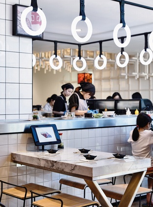 The sushi train’s restrained simplicity and sense of stillness give it its strength of character.