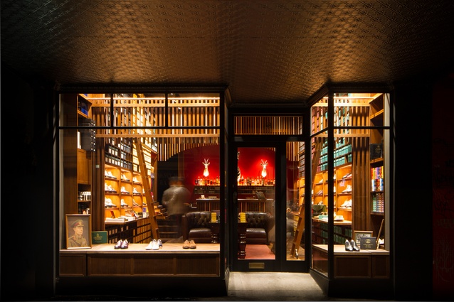 Chesterfield sofas, wooden ladders and low lighting make this store appear like a Victorian smoking lounge.