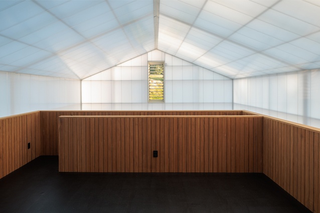 The mezzanine space on top of the inner building – inside the outside structure. Natural light is filtered and dispersed evenly and recycled rubber flooring creates a hardy, easy-clean acoustic surface.