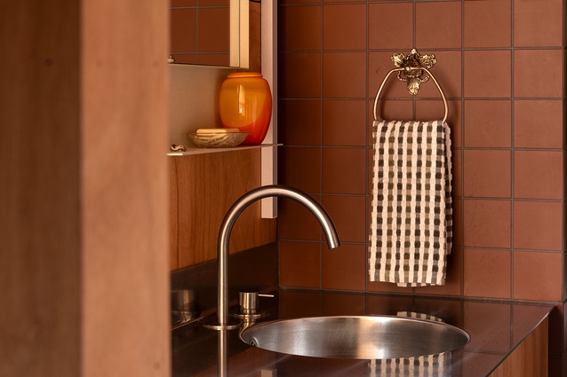 The bathroom has a combination of oiled ply, terrazzo floors and winckelman tiles. 