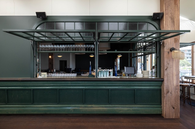 Bivacco restaurant on Auckland’s waterfront by Izzard Design features jewel-green tones, dark timber, travertine and marble in homage to timeless Italian style.