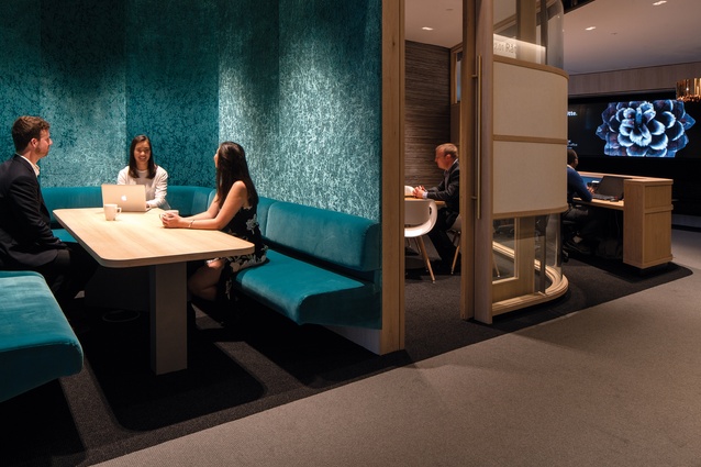 The meeting booth within the pod features Boratti Ocean fabric on the walls and Varese on the booth seats, both sourced from Designers Guild. The table is American white oak.