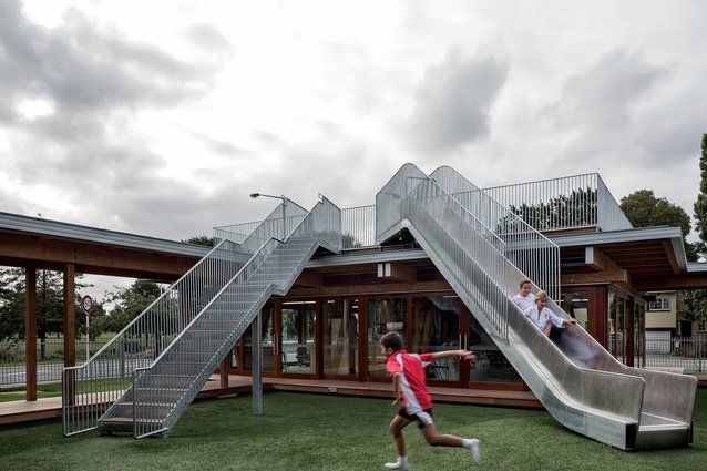 A roof deck on the corner pavilion looks out over the park and has a large slide on which to access the central courtyard. The rest of the building has been designed so that a roof deck can be added in the future if the school so desires.