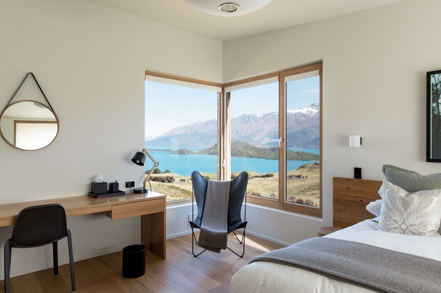 Each guest room has a personal window seat with southern light, lake views and calm material tones. 