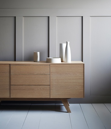 Dynamic, light, yet very strong Tierra sideboard has three drawers and an optional wine rack. 
