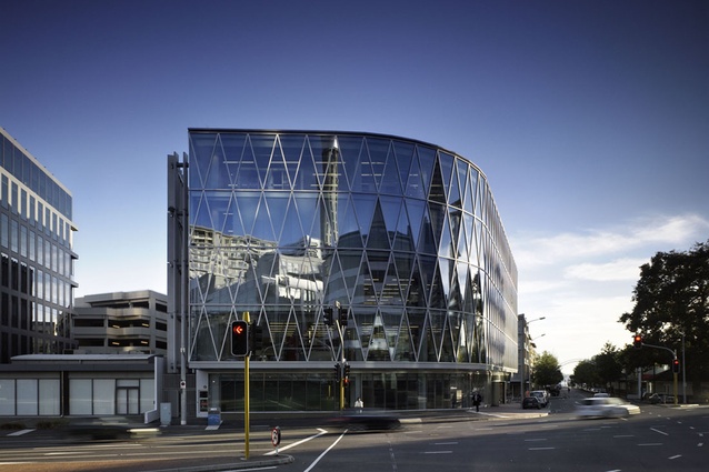 NZI Centre, Auckland by Jasmax. This building features a curved twin-skinned glass façade that is similar to a greenhouse, which inspired the delicate interior elements.