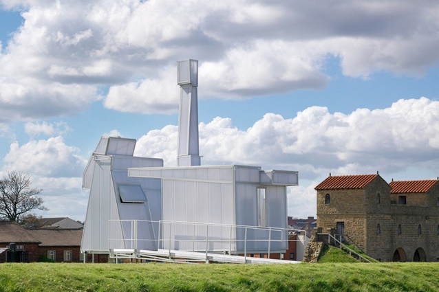 Temporary writers' residence, UK. This mobile structure is a reference to the area's industrial architecture and features a dysfunctional chimney stack and a set of fin-like shutters.
