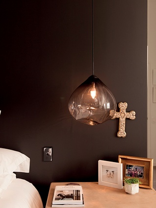 Parison pendant lights: "Their unusual shape creates really lovely crystalline patterns on the walls. Also, John loves to read in bed and I find these are easier to sleep with."