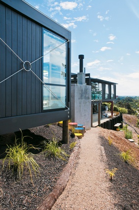 The exterior of the Box Living house in Enclosure Bay, Waiheke Island.