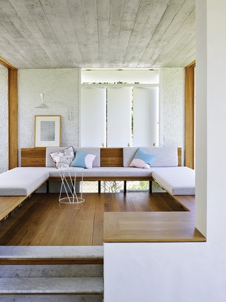 A sitting room hovering over a rolling landscape provides a “genuinely external experience.” Artwork: Eugene Carchesio.