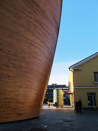 The curved boat-like timber exterior.