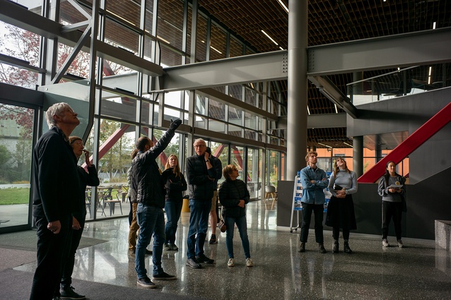 Giuseppe Lopocaro (Civil Engineering) from the University of Canterbury takes a group through buildings on campus that demonstrate innovation in post-quake engineering on Sunday at Open Christchurch 2021.