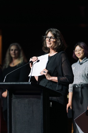 Lynda Simmons accepts the inaugural John Sutherland Practice Award on behalf of all current and past members of Architecture+Women NZ.