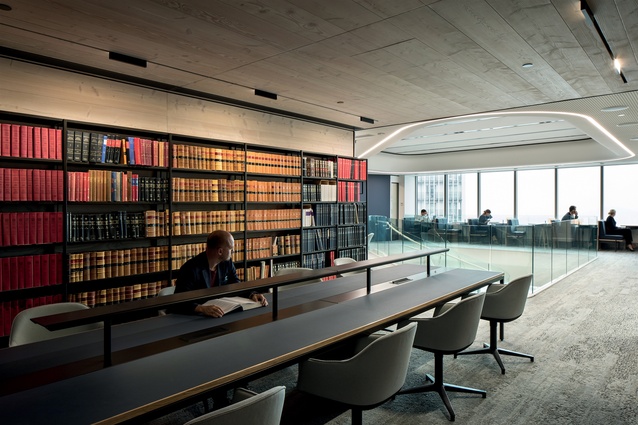 The deliberate transition between the timber-clad library room and the futuristic hub signals the firm’s esteem for the binary of past and future.