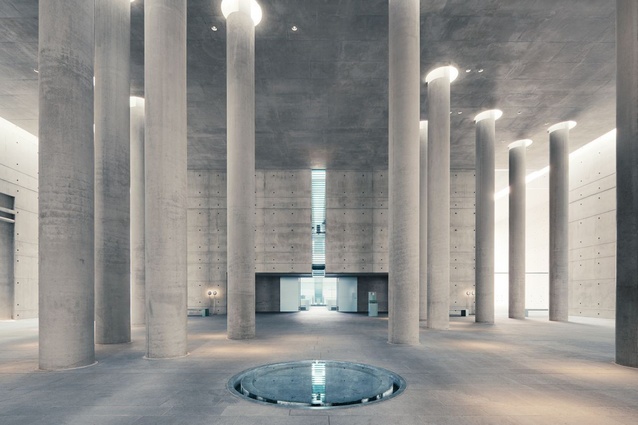 Crematorium Baumschulenweg. A space of epic proportions that includes an array of columns featuring capitals of light, which represents spirituality, love and remembrance.