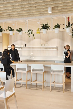 The staff kitchen and eatery is light and calming, and sits close to the atrium.