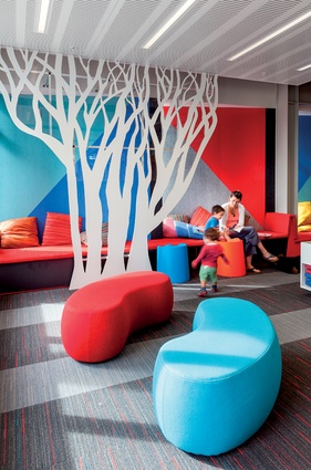 This tree-like screen is used in the children’s area to create a private child scaled space.