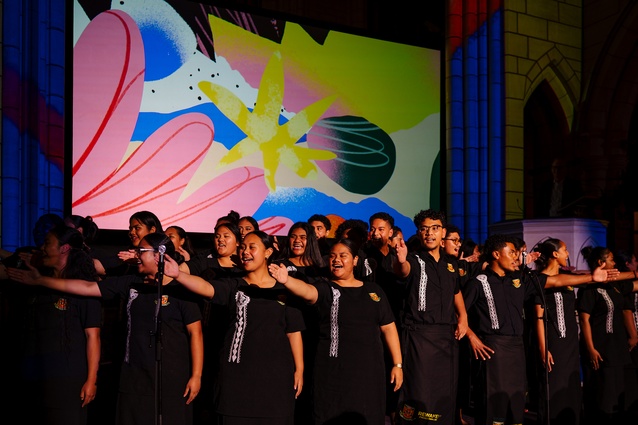 The Rewaken Polycation Choir performs before the 400 guests.