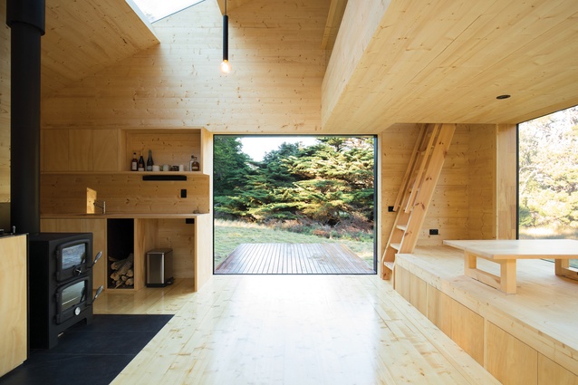The open-plan cabin interior is designed without any loose furniture that might clutter the solitude.